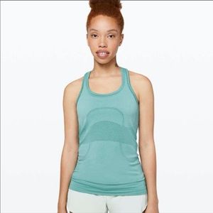 NEVER WORN teal green swiftly tank size 6